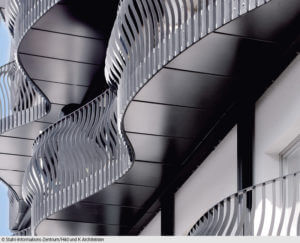 Foto: Stahl-Informations-Zentrum/ Hild und K Architekten Kombinierte Konstruktion: punktuell in der Fassade rückverankerte Stützen