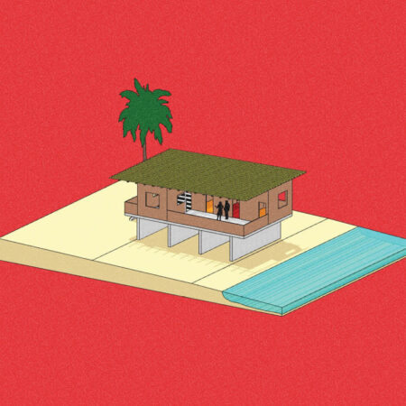 Modell eines Hauses auf dem Strand am Meer